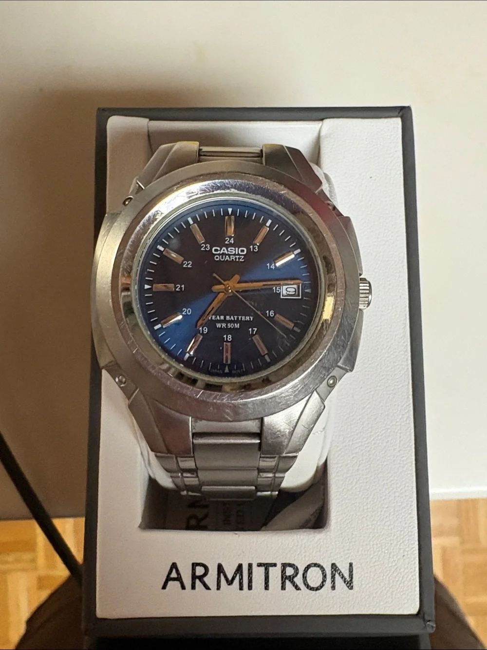Casio Silver Stainless Steel Watch with Blue Dial